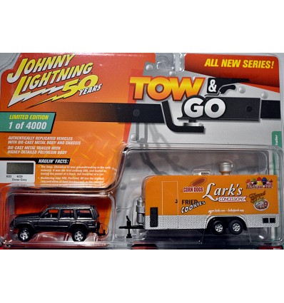 Johnny Lightning - Tow & Go - Jeep Cherokee XJ and Larks Concessions Carnival Trailer