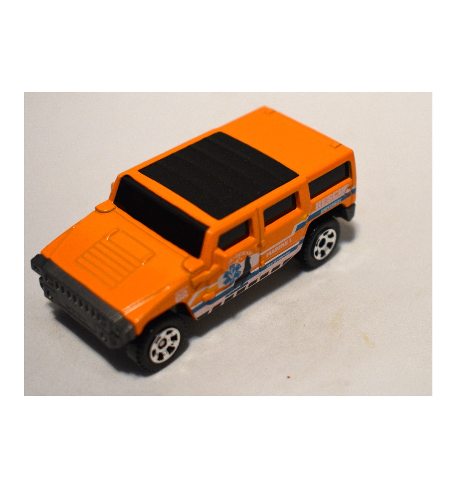 orange hummer h2 truck
