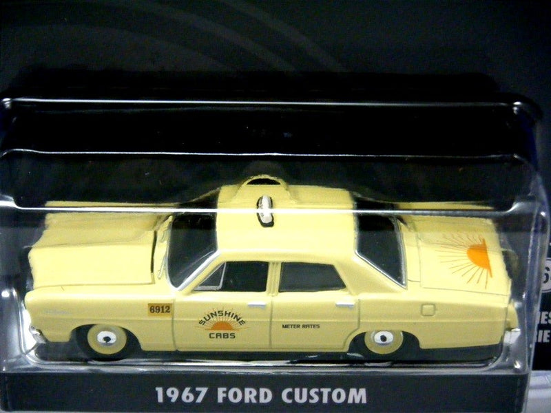 Greenlight Hollywood Series - Steve McQueen Bullitt -  1967 Ford Custom - Sunshine Taxi