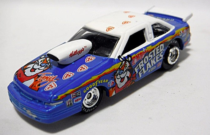  Johnny Lightning Racing Dreams - 1996 Oldsmobile Cutlass NHRA Pro Stock - Tony The Tiger - Frosted Flakes