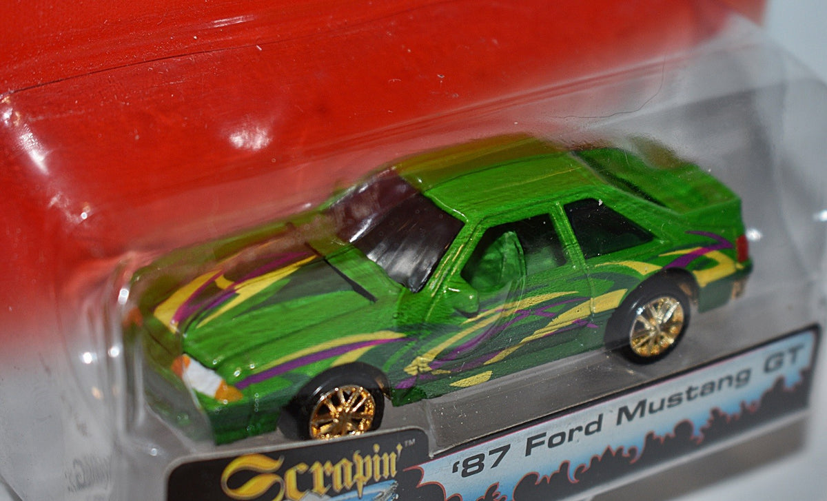 Johnny Lightning Street Freaks - Scrapin - Lowriders - 1987 Ford Mustang GT Lowrider