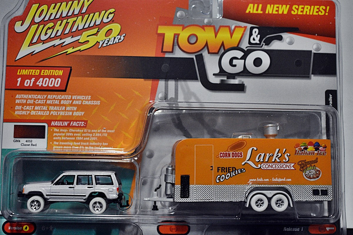 Johnny Lightning - White Lightning -Tow & Go - Jeep Cherokee XJ and Larks Concessions Carnival Trailer