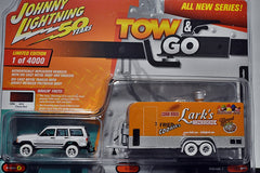 Johnny Lightning - White Lightning -Tow & Go - Jeep Cherokee XJ and Larks Concessions Carnival Trailer