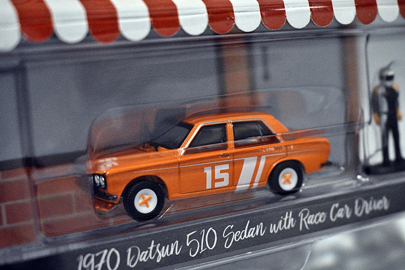 Greenlight Hobby Shop - 1970 Datsun 510 Sedan with Race Car Driver
