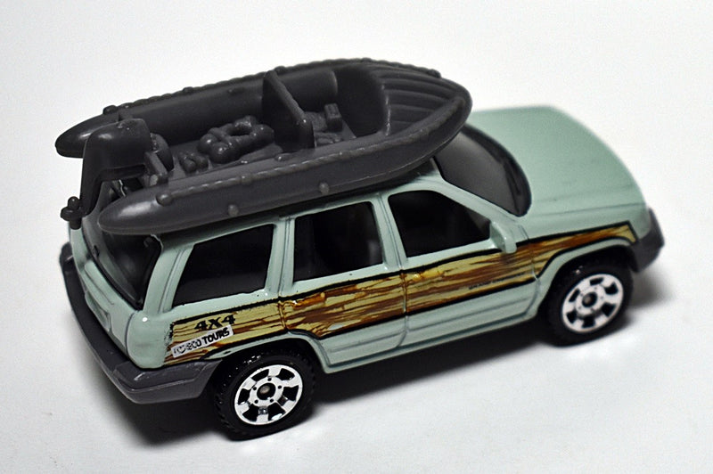 Matchbox Jeep Grand Cherokee with Raft