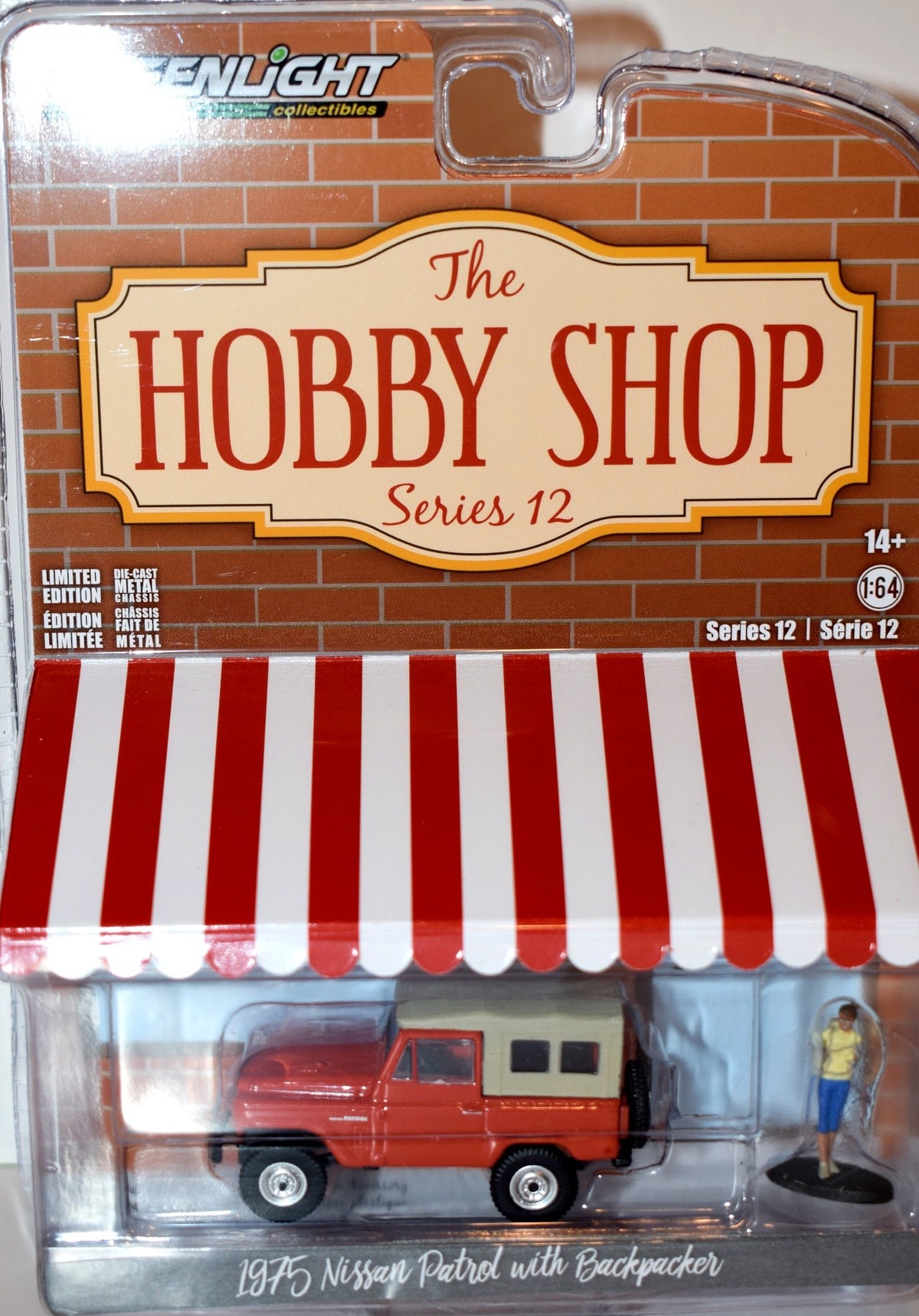 Greenlight Hobby Shop - 1975 Nissan Patrol with a Backpacker
