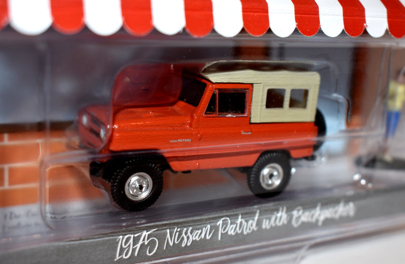 Greenlight Hobby Shop - 1975 Nissan Patrol with a Backpacker
