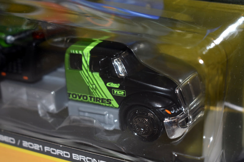 Maisto Elite Transport - International Durastar Flatbed and 2021 Ford Bronco WIldTrak