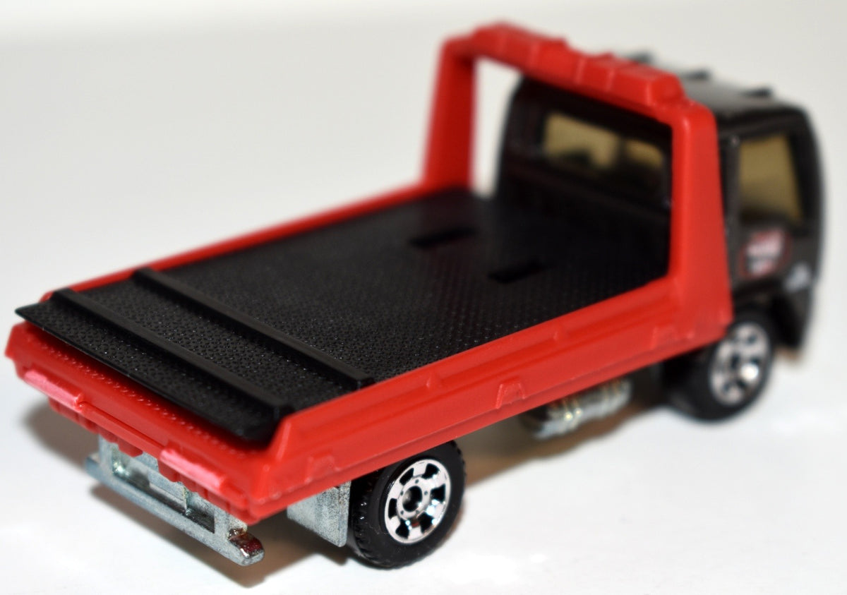Matchbox - Isuzu Delivery Flatbed Tow Truck